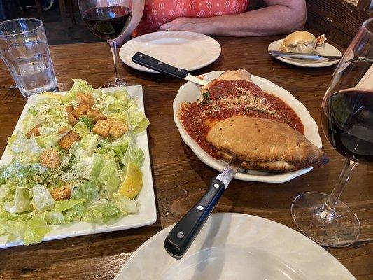 Large Caesar salad and original calzone.