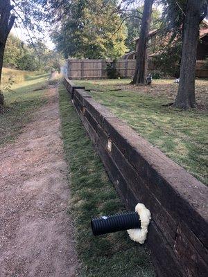 AFTER   French drain & new retaining wall