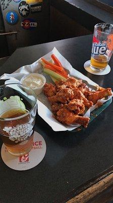 Labatt blue grapefruit (drink) hot garlic-parm wings with blue cheese! (Always)