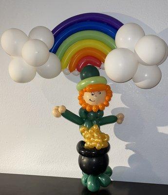 Leprechauns with rainbow and pot of Gold. Black and gold and green balloons purchased from Bay Party store