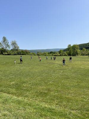 Activities are planned for the kids. This was a kickball game adults versus kids.