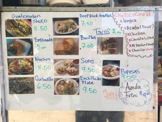 Menu on the side of the truck. Alex and his crew whip up some BOMB food!