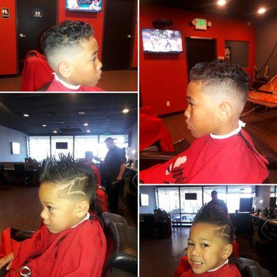 Kid Friendly Barbershop: Basketballhoop, television, and game systems for entertainment!