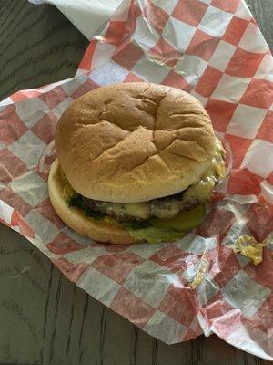 Weak cheeseburger for $8.50, with no sides, no fries, no chips, nothing.