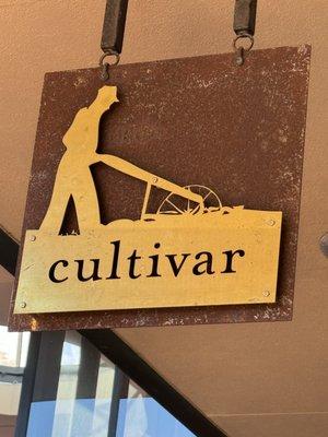 Look for our brass sign of our Cultivar logo