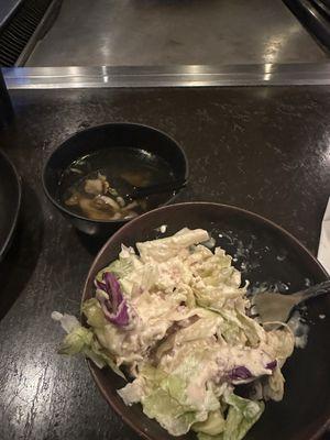 Soup and salad served before meal