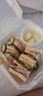 Club sandwich and potato salad.