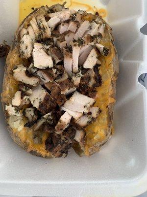 Stuffed Smoked Turkey Potatoe.  I requested no sour cream or chives. The Potatoe includes BBQ sauce on the side. #delish