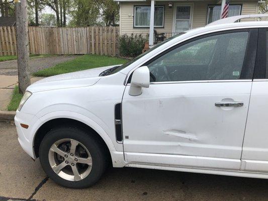 Damage to my vehicle door before repairs