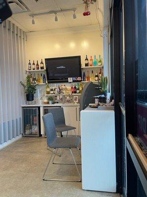 Waiting area with drinks, tv, Wi-Fi available