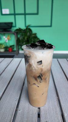 Grass Jelly Coffee with Coconut Cream - Our iced coffee based with grass jelly and topped with coconut milk