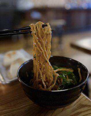 Sesame Peanut Noodles w/ fried garlic, cucumber, scallions ($9)