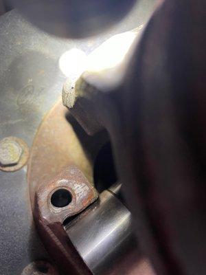 Bolt hole crushed by larg hammer nessitated replacement of transaxle u-joint yoke.