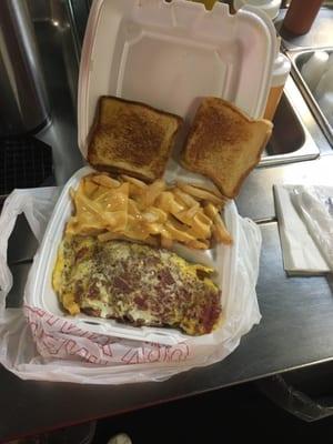 Corn beef omelette  with cheese fries