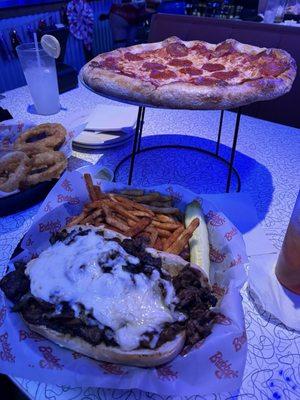 Philly Cheese Steak* ,Pepperoni Tuesday Pizza Night, onion rings