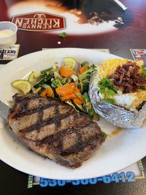 New York strip done to perfection. Loaded baked potato and great vegetables too! Yum!