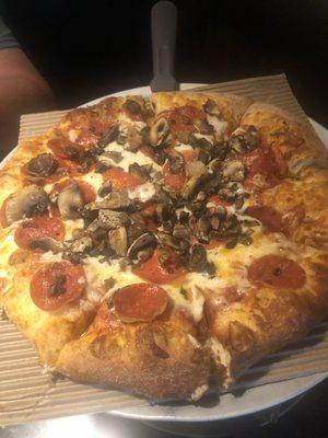 Pepperoni and mushroom pizza.