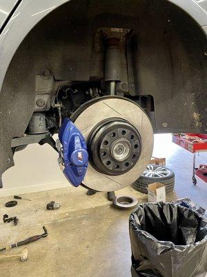 Replaced brake calipers, rotors, pads, lines, and sensor on a BMW 340i