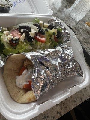 Chicken wrap with small Greek salad