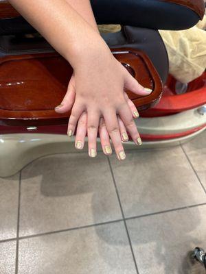 My daughter's beautiful sparkling nails.