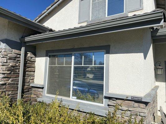 new front gutters over front bedroom with proper down tube to code