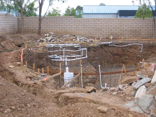 New pool construction plumbing before gunite.