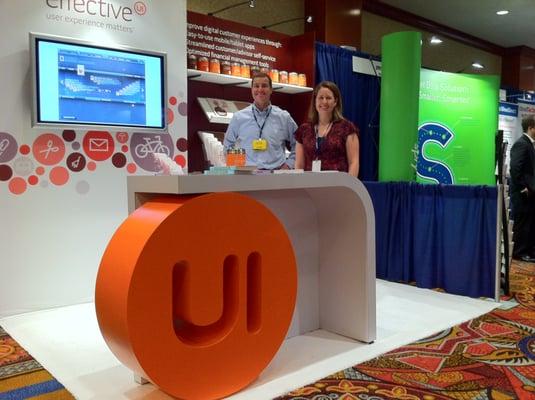 The colorful EffectiveUI trade show booth