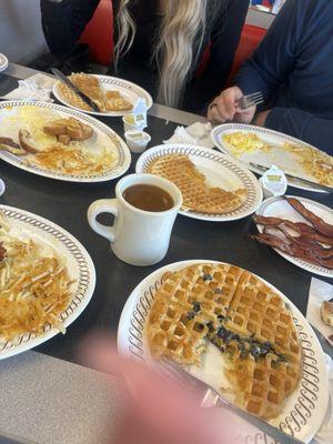 $12 deal includes huge waffle, bacon, eggs, toast and hashbrowns.