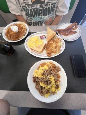 Sausage Egg & Cheese Hashbrown Bowl and waffle breakfast with bacon eggs, hash brown and toast.