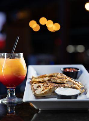 Tequila Sunrise and our famous quesadillas