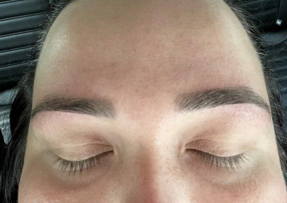 Eyebrow threading and tint.