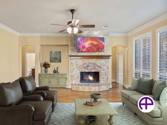 Virtually staged den with lit fireplace, featuring AccuResidentialPhotos™, AccuColorAccuratePhotos™, AccuVirtualStaging™, and...