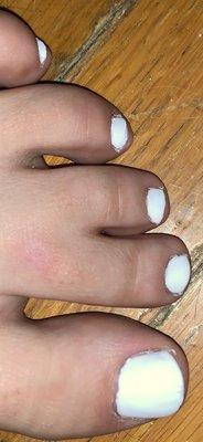 Sloppy gel pedicure - white polish