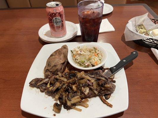 Roumanian tenderloin medium rare smothered in sautéed mushrooms and onions with baked sweet potato and health salad. My fave.