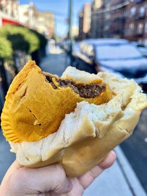 Beef Patty sandwiched between Coco bread