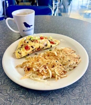 Salmon omelette and hash browns