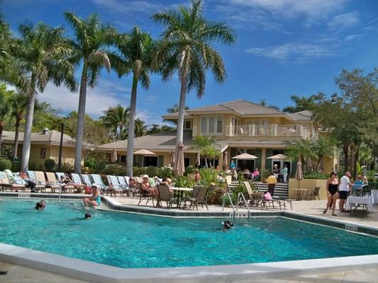 Tarpon Cove Yacht & Racquet Club features a Tropical Courtyard with heated pool, tropical drinks, local inspired menus pool side