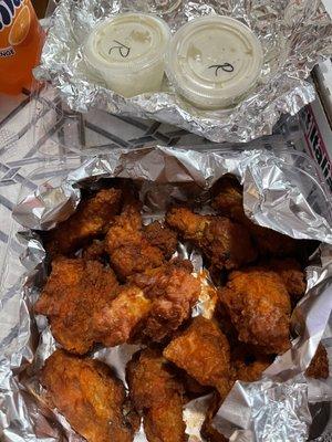 Buffalo chicken wings, pretty big and with breading