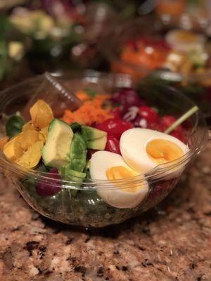 100% Organic Farmers salad ingredients- avocado, grape tomato, delicata squash, spinach and mix greens, shredded carrots