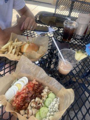 Kickapoo Adventures Bar & Grill / Cobb Salad / Burger + Fries / Frozen Island Mai Tai