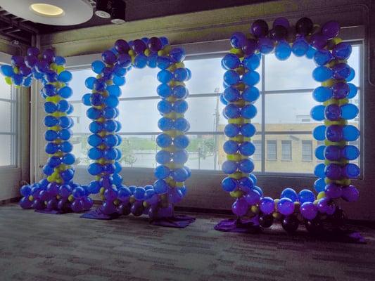 Giant 100 made out of balloons