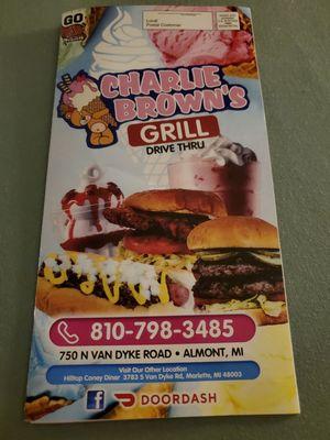 Front of Menu + I've attached each page inside...Oh My Deeeelicious at this Charlie Brown's location in Almont Michigan. 5/30/2024