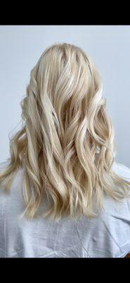 Global blonde with textured beach waves for styling.