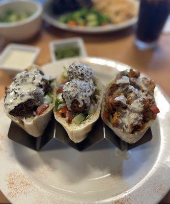 Trio. Steak, falafel and chicken. So good