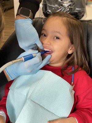 Larissa doing her teeth cleaning