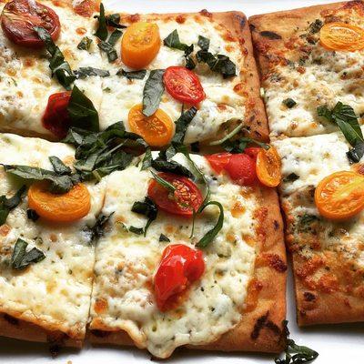 Heirloom Tomato Flatbread!  We always use fresh, seasonal ingredients.