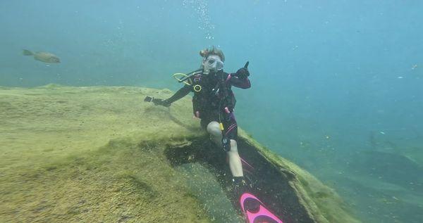 Kaitlyn Andrew scuba diving with guide, Jeremy Baxter. Shipwreck!