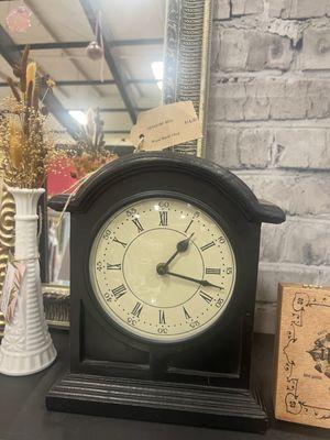 Cool antique booth with a neat mantel clock