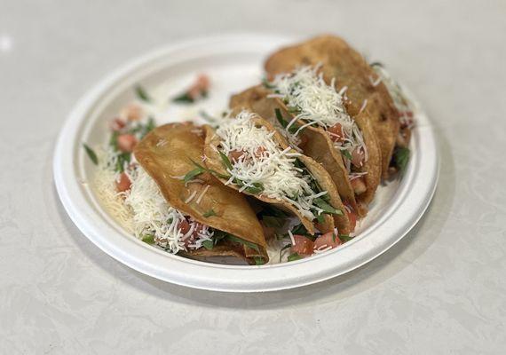 Crispy Taco: SHREDDED BEEF, CHICKEN, GROUND BEEF, OR POTATO w/SPINACH, JACK CHEESE & DICED TOMATO | $3.95/$2 Tu. & Fri.