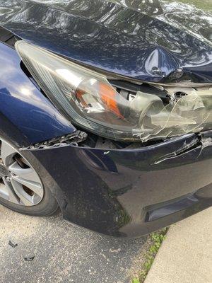 Damaged car parked in disability spot by disabled resident - mgt took no responsibility of hired roofers dropping heavy shingles and tools